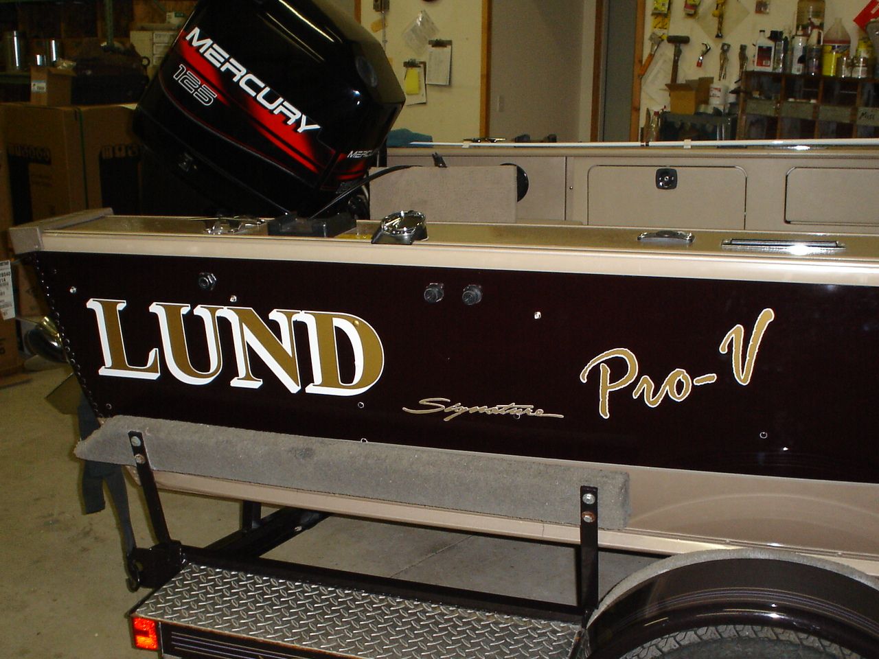 Here's my 10 year old boat with new lettering.