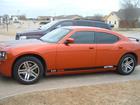 2006 Dodge Charger Daytona with all the badges removed and custom graphics from Signspecialists.