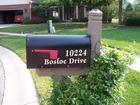 Our mailbox with new lettering and paint