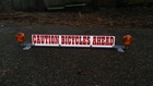 The CAUTION BICYCLES AHEAD reflective sign setup