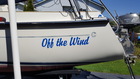 Aft quarter of Com Pac Eclipse sailboat