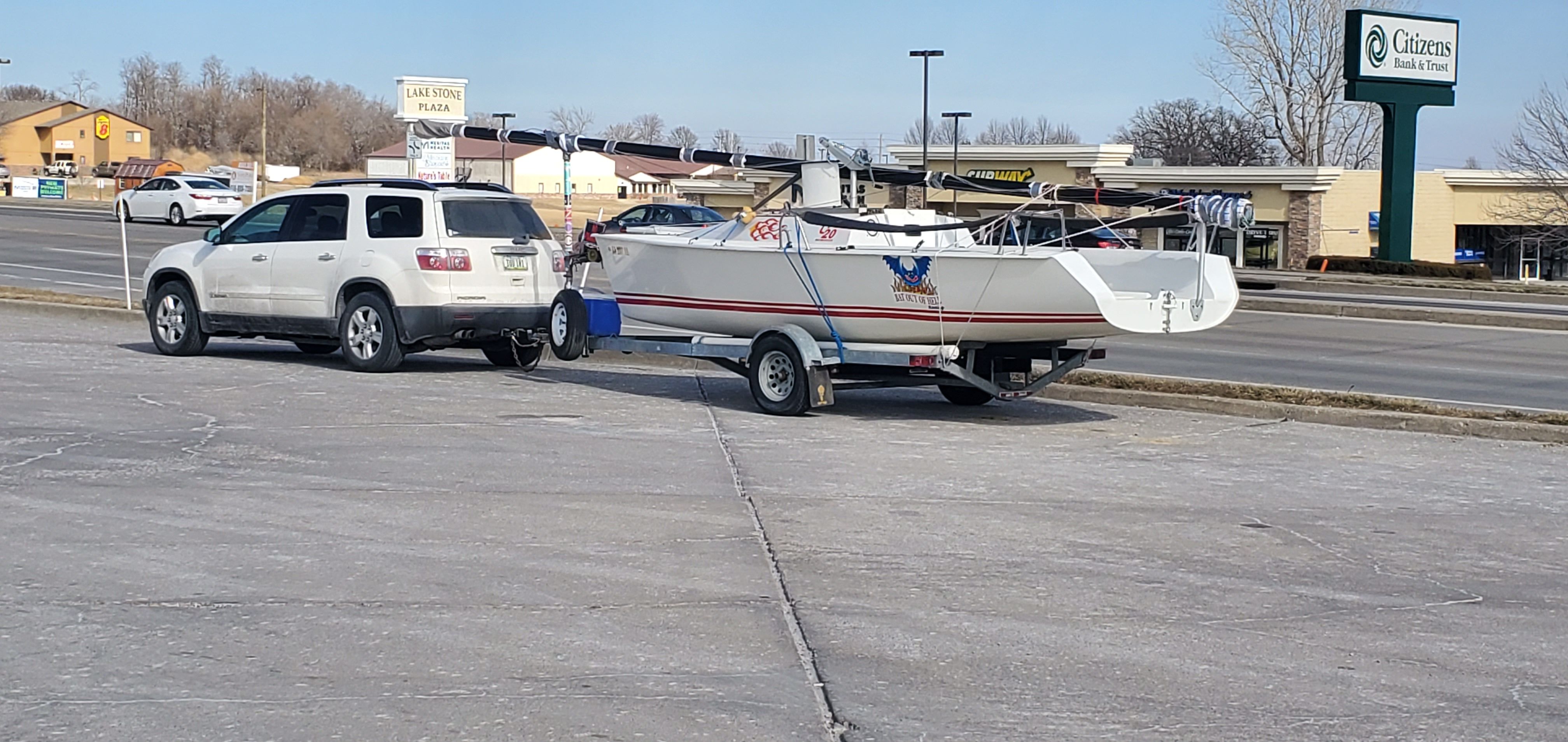 Sailboat with new name and registration graphic.