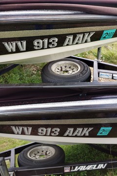 Port and Starboard sides of my boat after the new license decal installation